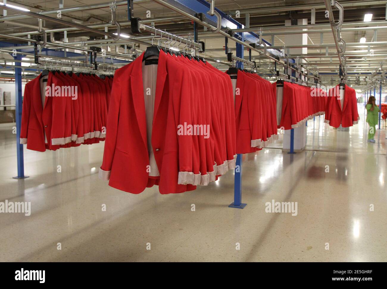 A woman works at the Zara factory at the headquarters of Inditex group in  Arteixo, northern Spain, June 14, 2012. Spain's Inditex SA, the world's  largest clothes retailer, bucked Europe's financial crisis