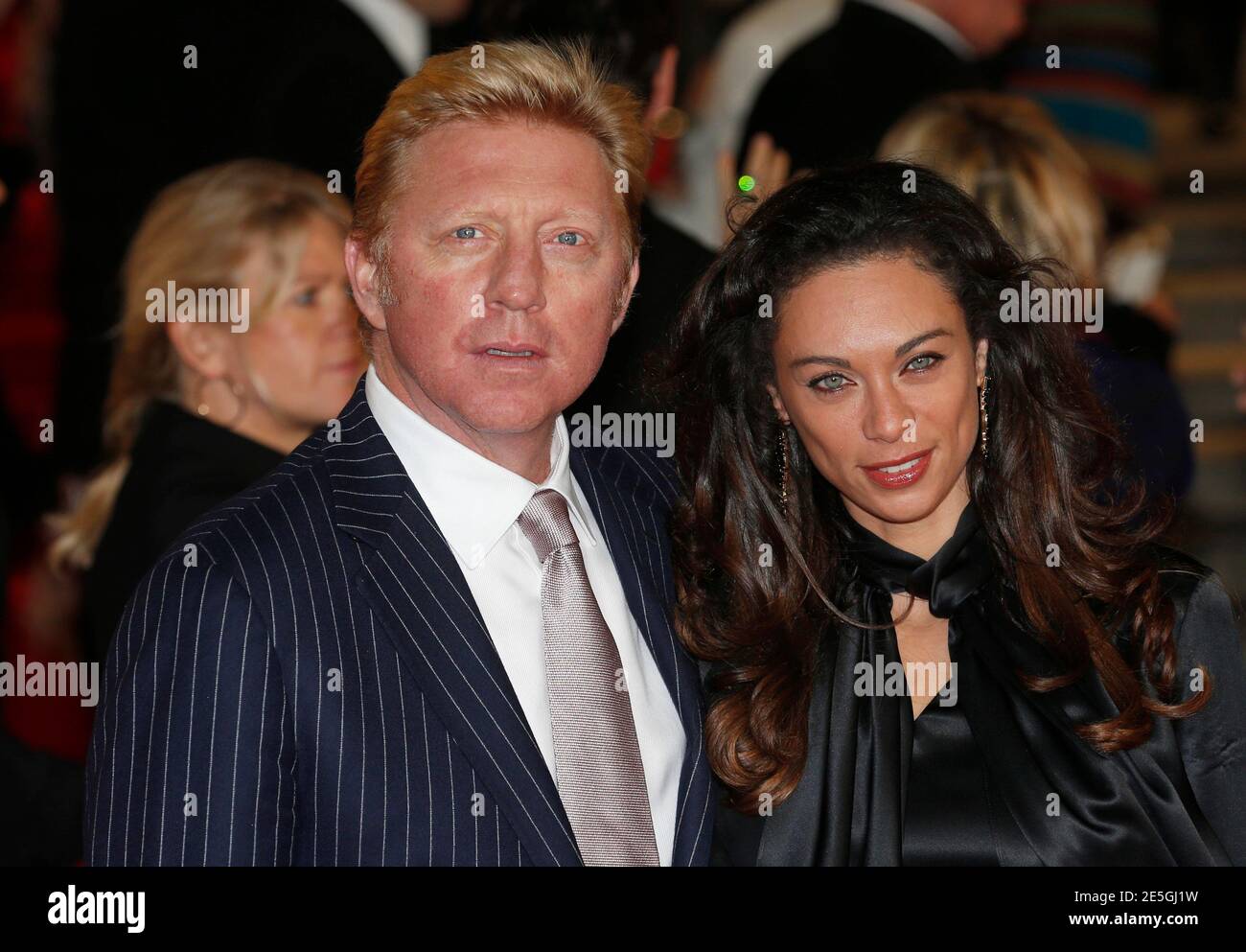 Former German tennis champion Boris Becker and his wife Lilly arrive for  the royal world premiere of the new 007 film Skyfall at the Royal Albert  Hall in London October 23, 2012.