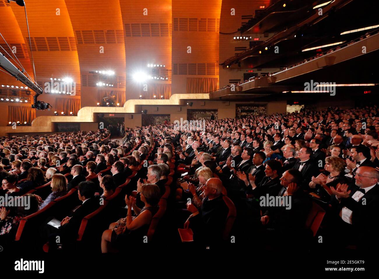 Audience members applaud during the American Theatre Wing's annual Tony  Awards at Radio Music City Hall in New York June 9, 2013. REUTERS/Lucas  Jackson (UNITED STATES - Tags: ENTERTAINMENT) (TONYS-SHOW Stock Photo -