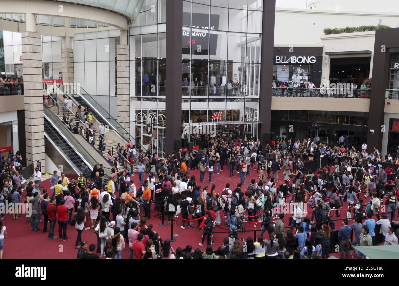 Shoppers queue to enter the newly opened Hennes & Mauritz (H&M) store in  Peru, at the Jockey Plaza mall in Lima, May 9, 2015. Swedish fashion giant  H&M, one of the world's
