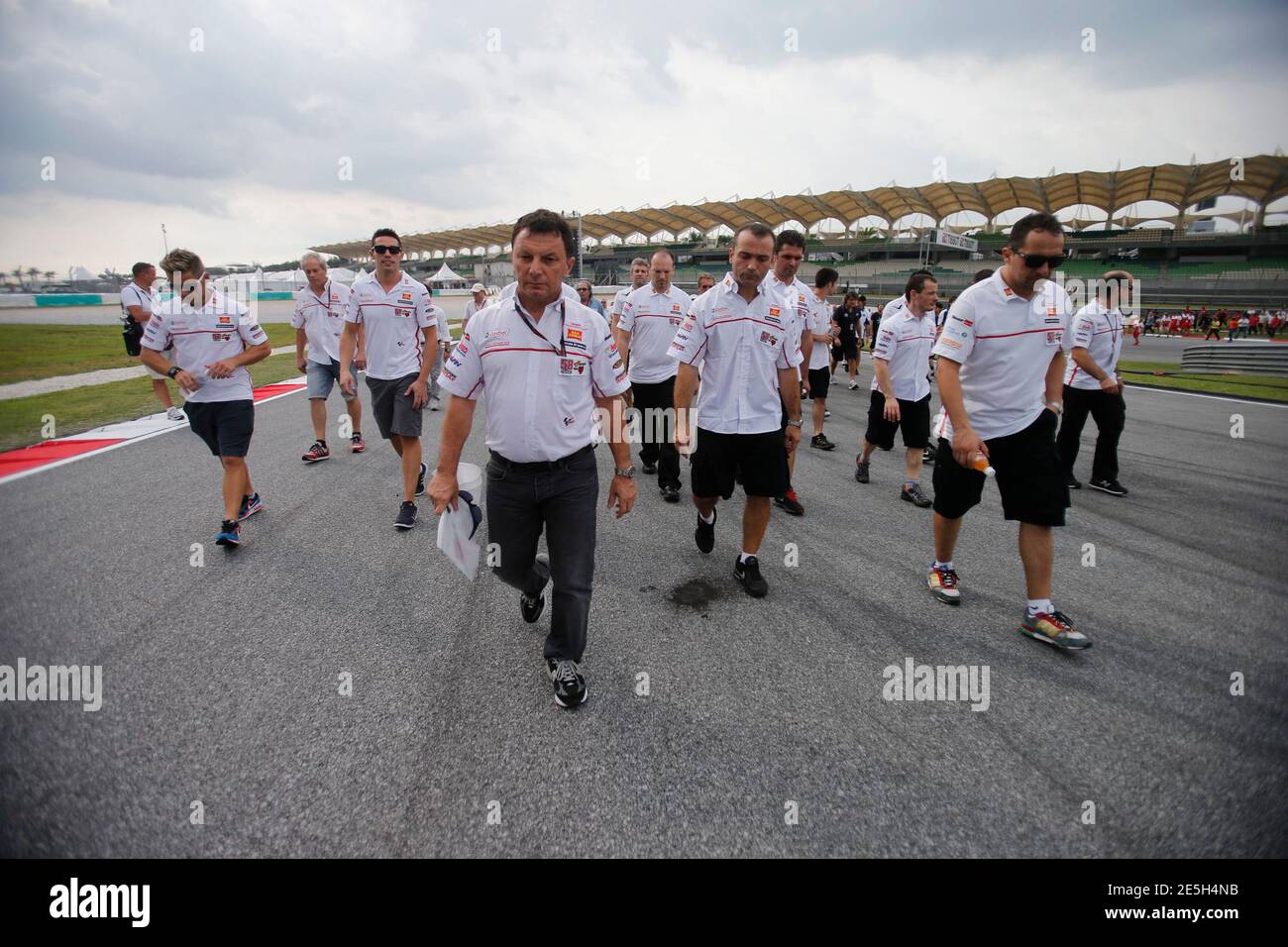 Manager Of Honda Motogp Team Fausto Gresini Front C Leads Members Of The Motorcycle Grand Prix