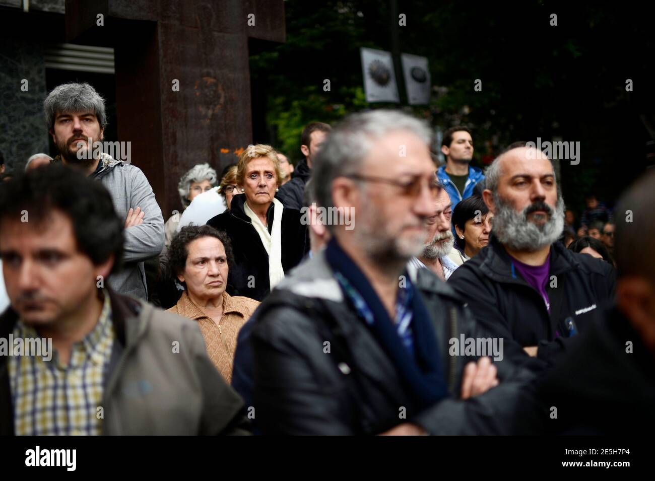 Supporters listen to speeches during Basque peace association Gesto Por La Paz (A Gesture For Peace) final meeting in Bilbao June 1, 2013. The peace group decided to finish after 28 years of existence, following armed Basque separatists ETA's 2011 permanent ceasefire and cessation of armed activity. REUTERS/Vincent West (SPAIN - Tags: POLITICS CIVIL UNREST) Stock Photo