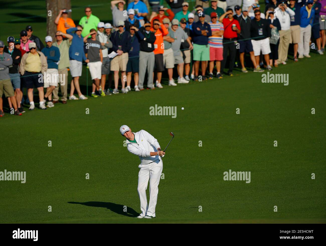 U.S. amateur golfer Jordan Niebrugge hits from the second green during the first round of the 2014 Masters golf tournament at the Augusta National Golf Club in Augusta, Georgia April 10, 2014. REUTERS/Brian Snyder (UNITED STATES  - Tags: SPORT GOLF) Stock Photo
