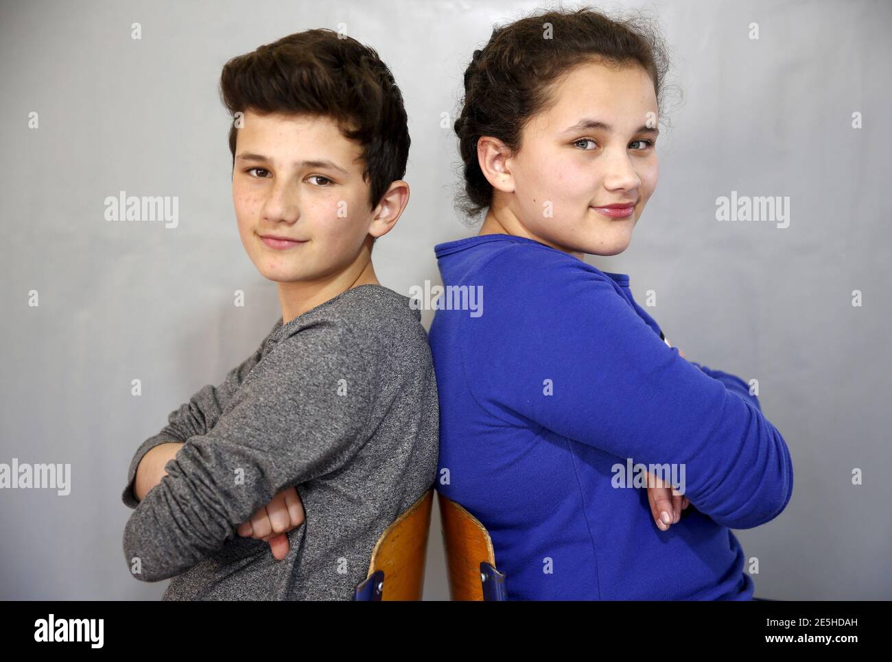 Twins Sara (R) and Samed Dizdarevic pose for a portrait at a primary school  in Buzim April 10, 2015. Nedzib Vucelj, a former teacher and journalist,  has launched an initiative to declare