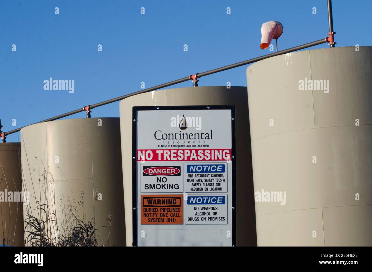Storage tanks stand on a Continental Resources oil production site near Williston, North Dakota January 23, 2015.  REUTERS/Andrew Cullen   (UNITED STATES - Tags: BUSINESS ENERGY COMMODITIES) Stock Photo