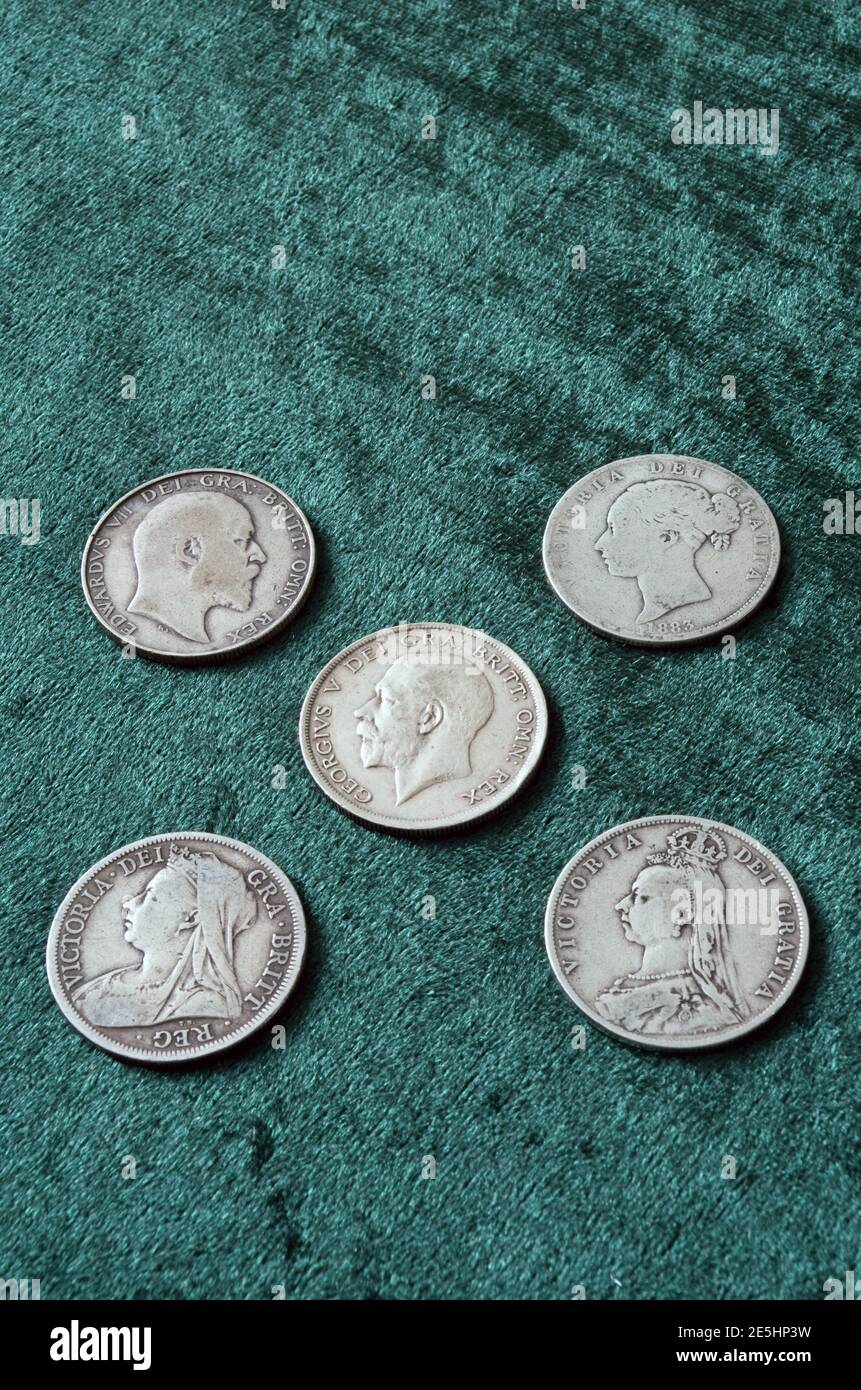 Obverse Side of British Sterling Silver ( 92.5%) Half Crown Coins Ranging From Queen Victorian, Edward VII & George V Stock Photo