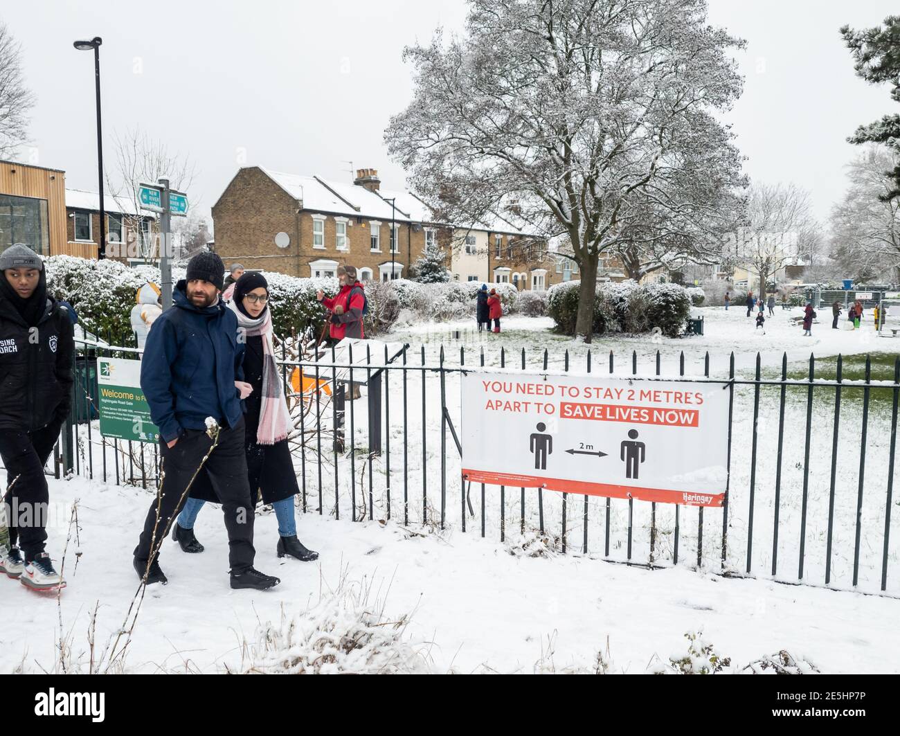 A rare snowfall in London enticed people out to exercise despite Covid-19 lockdown. Stock Photo