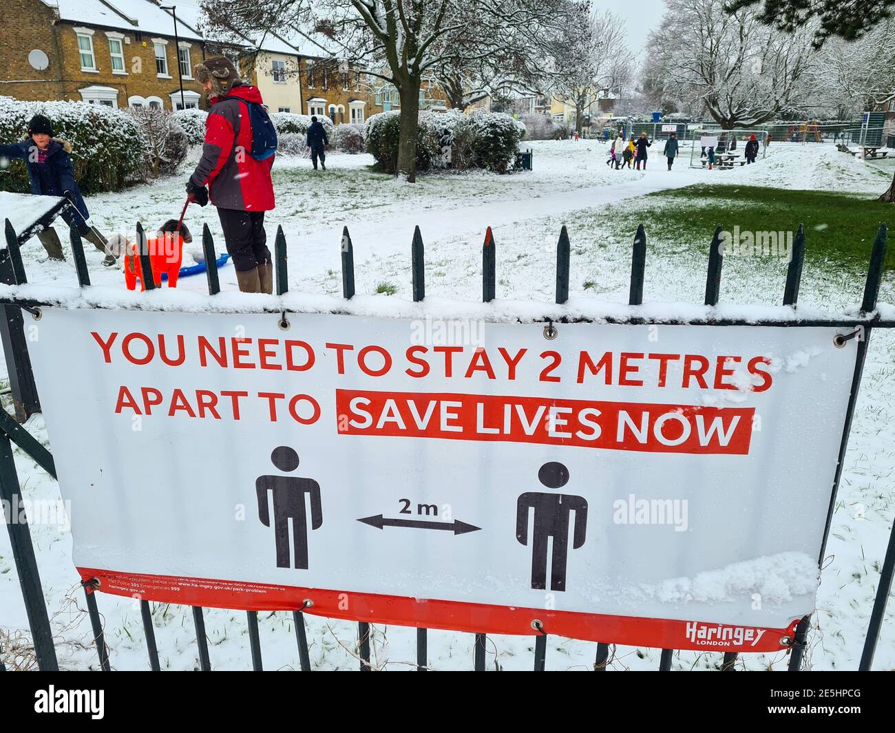 A rare snowfall in London enticed people out to exercise despite Covid-19 lockdown. Stock Photo