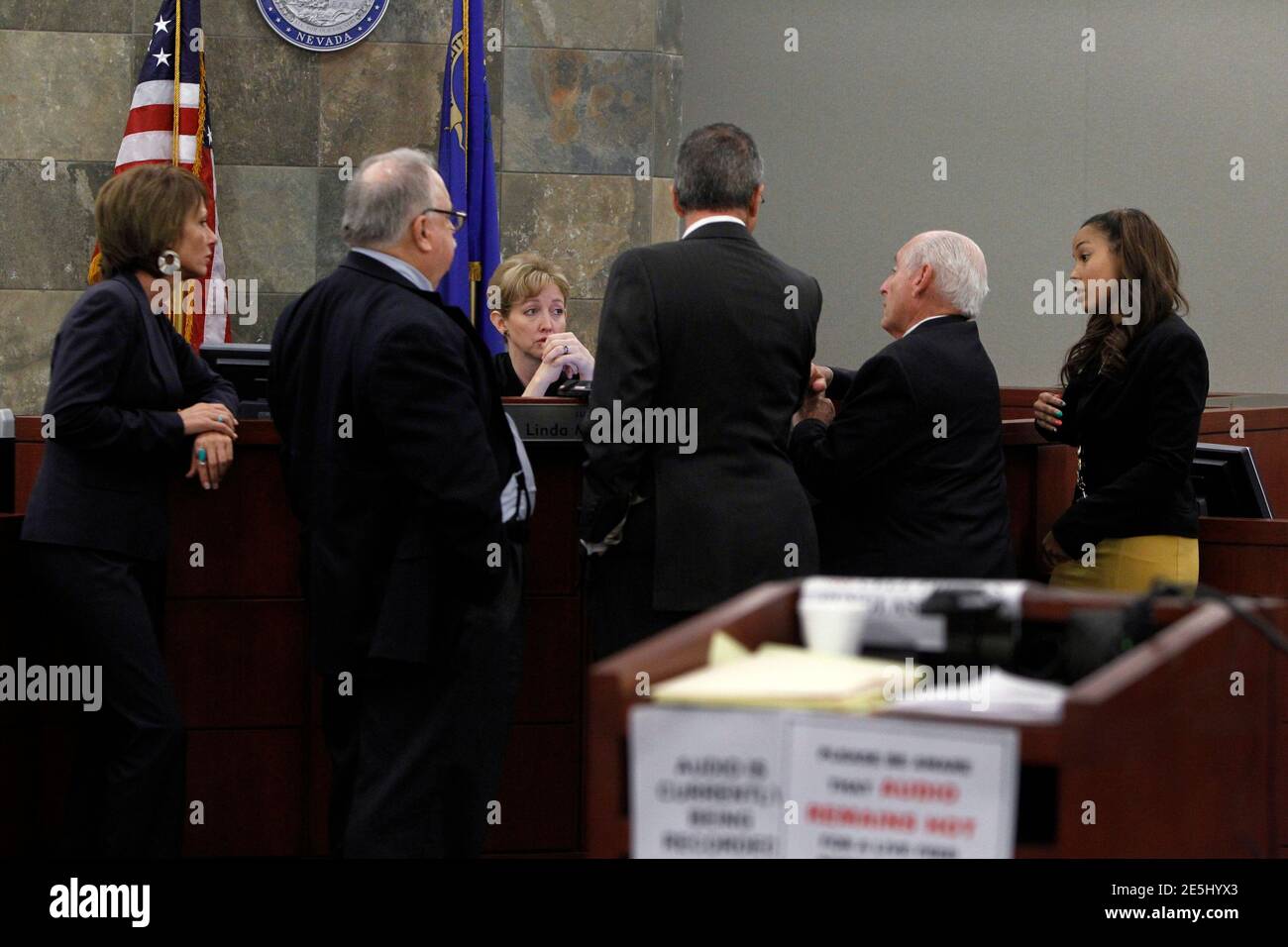 Judge Linda Marie Bell speaks with attorneys during a break in O.J. Simpson's evidentiary hearing in Clark County District Court on May 17, 2013 in Las Vegas, Nevada. Attorneys (L-R) are: Patricia Palm, Tom Pitaro, Ozzie Fumo, H. Leon Simon, chief deputy Clark County district attorney, and Leah Beverly, deputy Clark County district attorney. Simpson, who is currently serving a nine-to-33-year sentence in state prison as a result of his October 2008 conviction for armed robbery and kidnapping charges, is using a writ of habeas corpus to seek a new trial, claiming he had such bad representation  Stock Photo