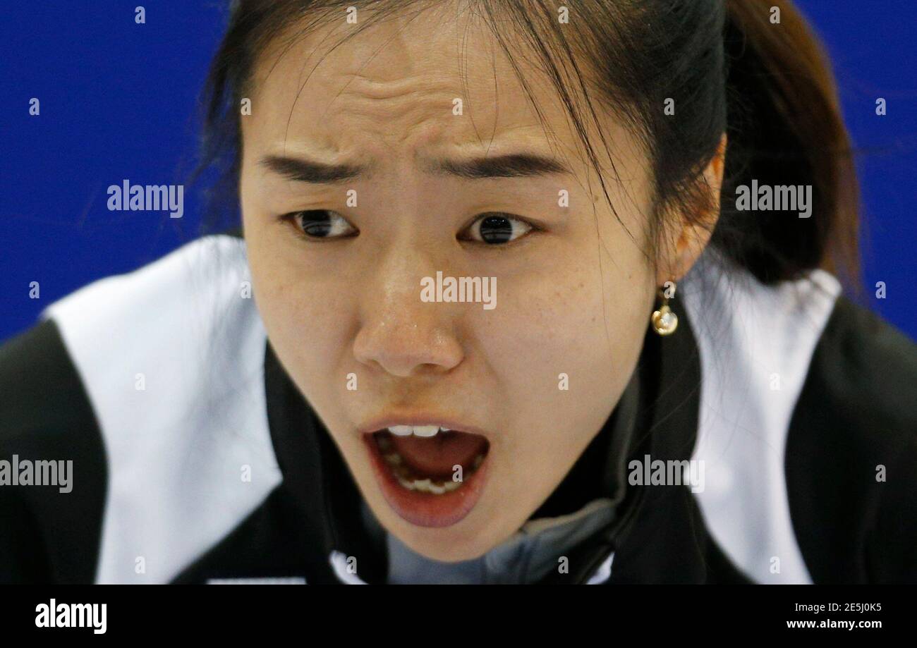 South Korea's skip Kim Ji-sun yells instructions to her teammates during  her semi-final game against Switzerland at the World Women's Curling  Championships in Saint John, New Brunswick, March 22, 2014. REUTERS/Mathieu  Belanger (