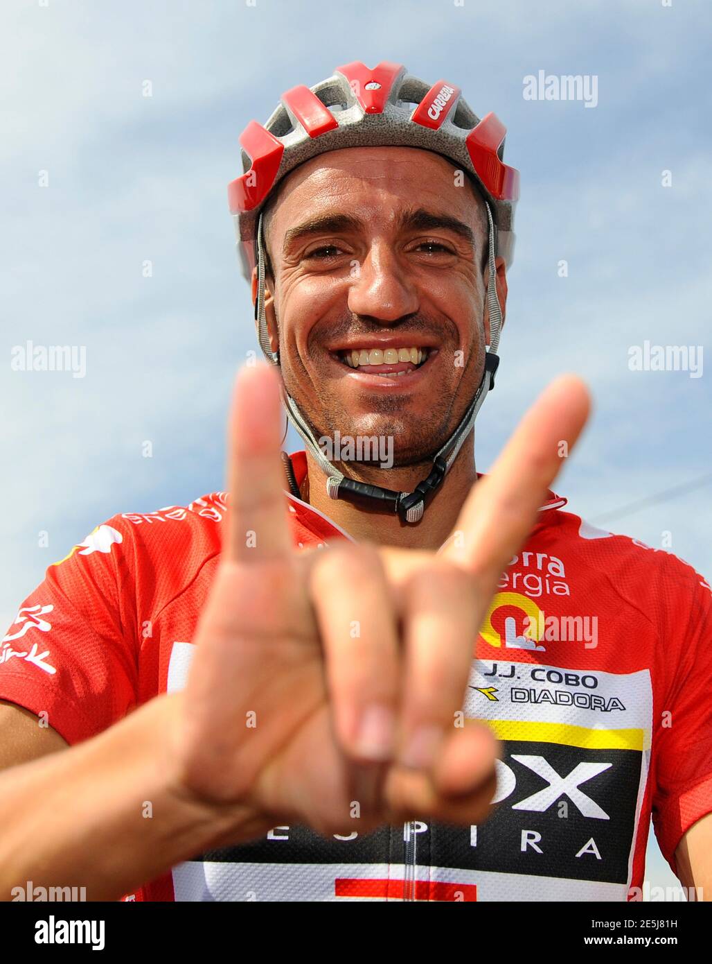 Geox TMC rider Juan Jose Cobo of Spain gestures before the start of the  20th stage of the Tour of Spain "La Vuelta" cycling race between Bilbao and  Vitoria September 10, 2011.