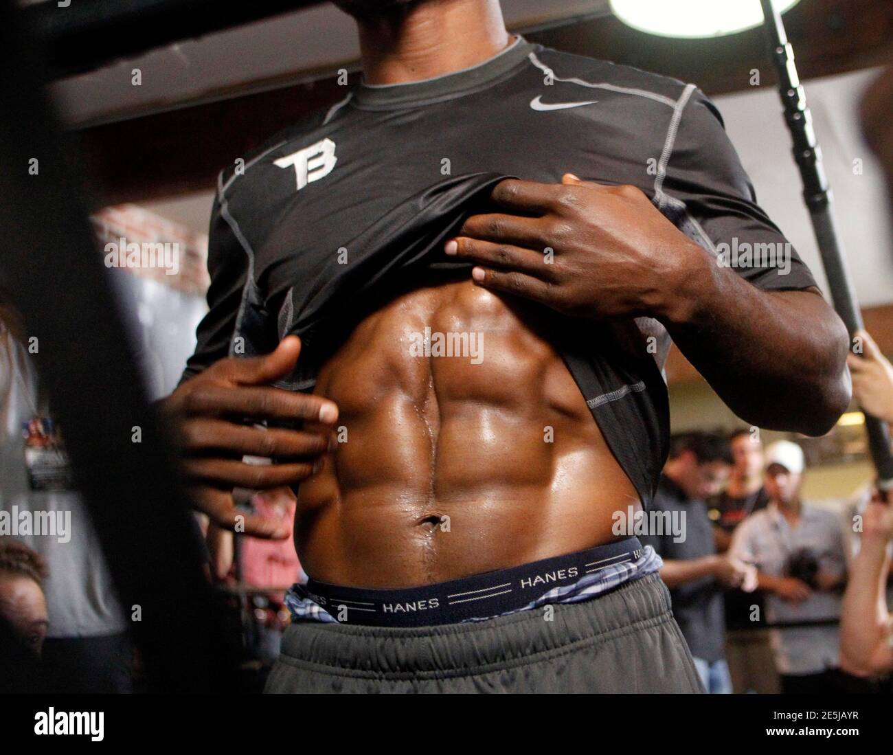 Undefeated World Junior Welterweight Champion Timothy Bradley Shows His Abdominal Muscles To A Member Of The Media During An Interview Before A Workout At Fortune Gym In Los Angeles May 29 2012