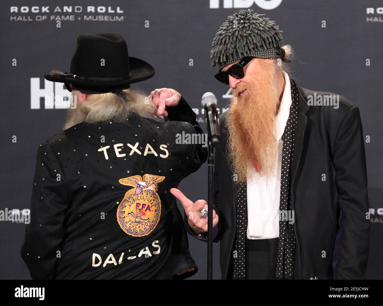 Billy Gibbons (R) of ZZ Top and bandmate Dusty Hill arrive for the 2012  Rock n' Roll Hall of Fame induction ceremony in Cleveland, Ohio April 14,  2012. REUTERS/Aaron Josefczyk (UNITED STATES -