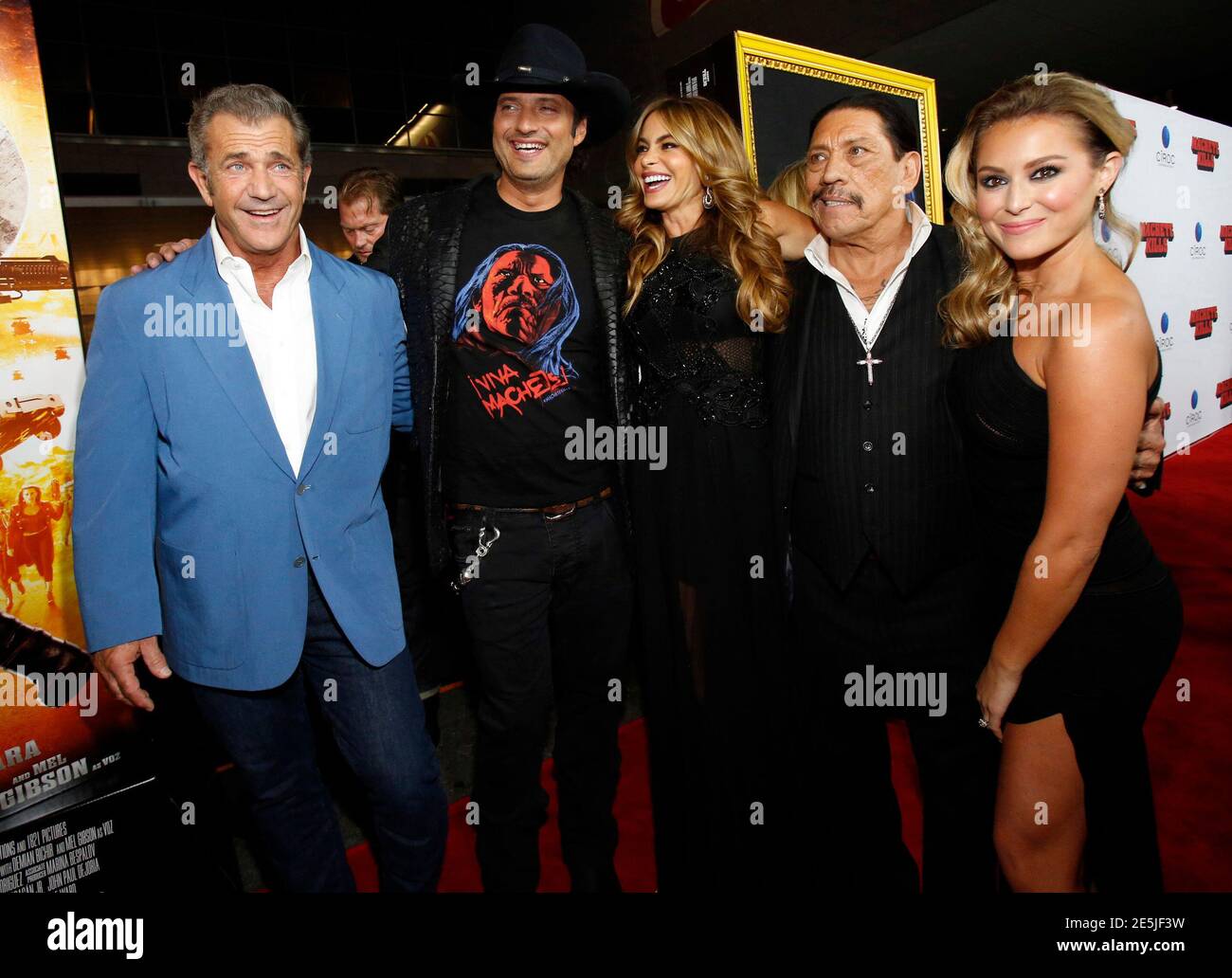 Director of the movie Robert Rodriguez (2nd L) poses with cast members Mel  Gibson, Sofia Vergara, Danny Trejo and Alexa Vega (L-R) at the premiere of "Machete  Kills" in Los Angeles, California