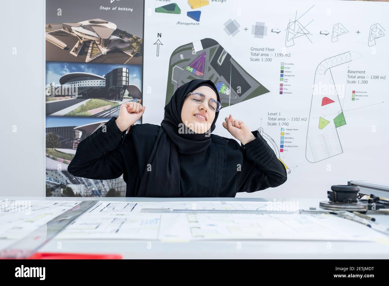 Arab female architect feeling tired Stock Photo