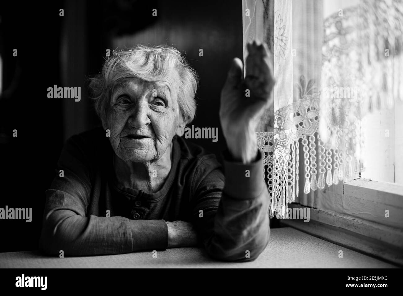 Old woman head in hands Black and White Stock Photos & Images - Alamy