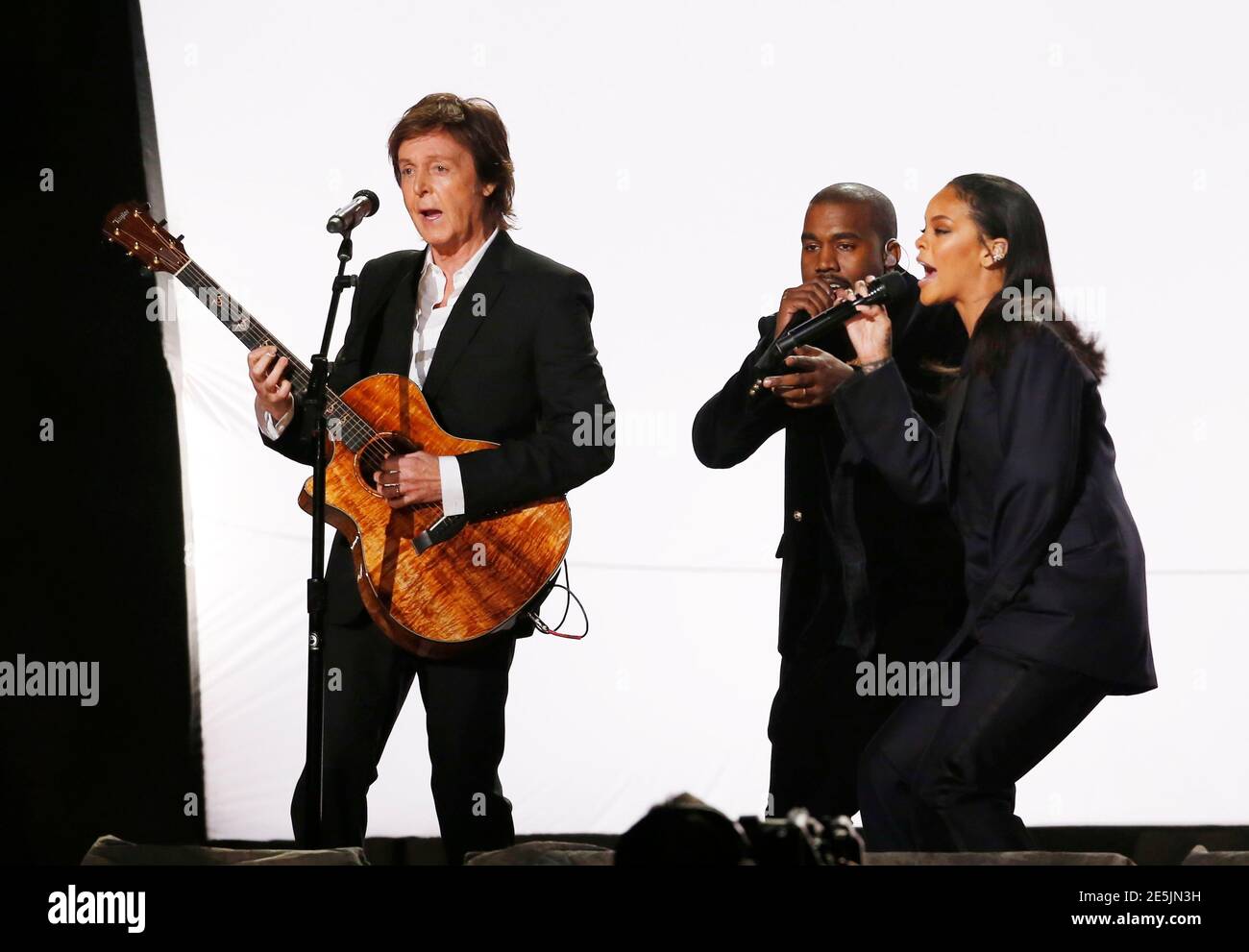 Paul McCartney, Kanye West and Rihanna (L-R) perform "FourFiveSeconds" at  the 57th annual Grammy Awards in Los Angeles, California February 8, 2015.  REUTERS/Lucy Nicholson (UNITED STATES - TAGS: ENTERTAINMENT) (GRAMMYS-SHOW  Stock Photo -