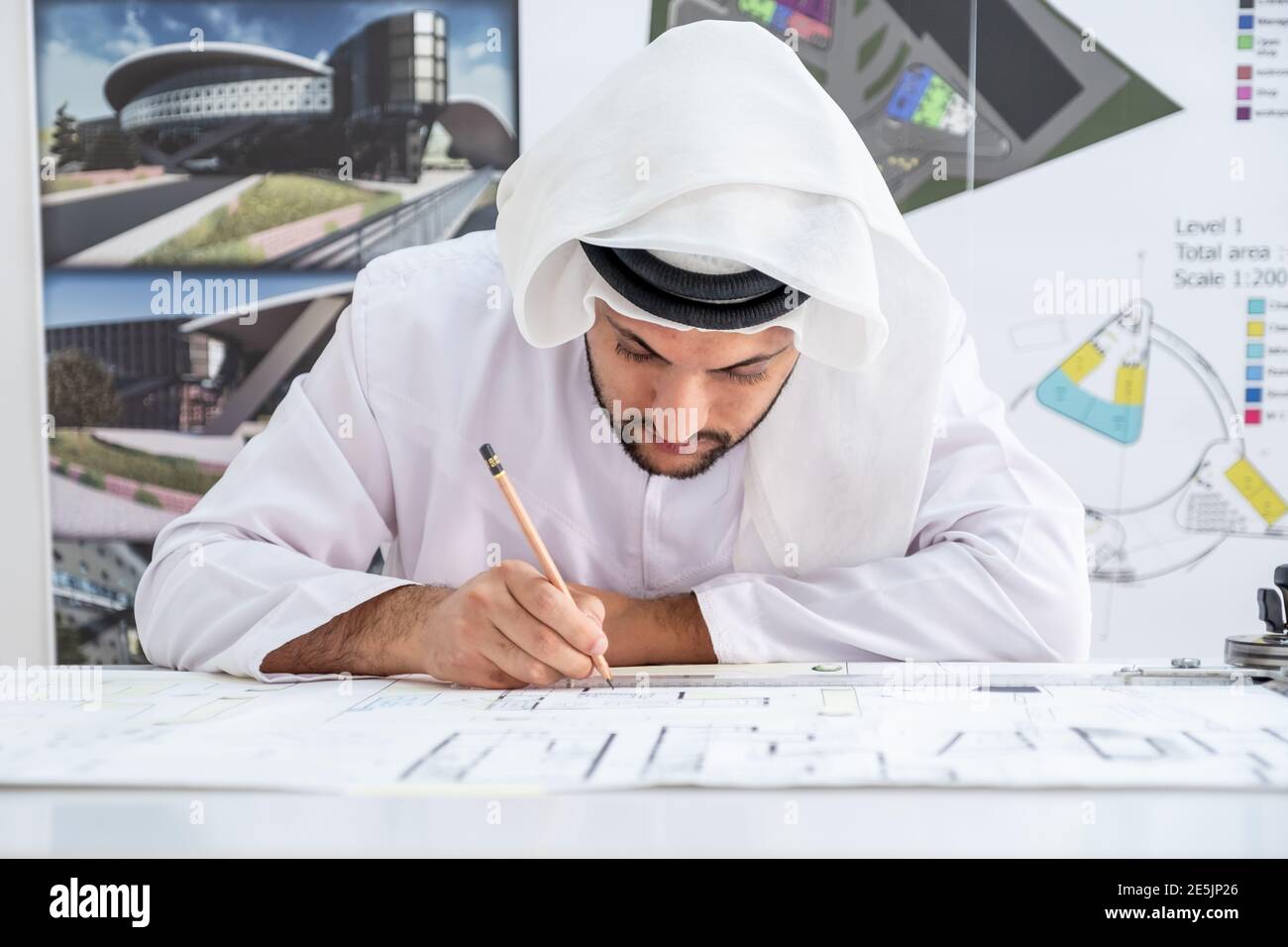 Focused arab architect working on a new project Stock Photo