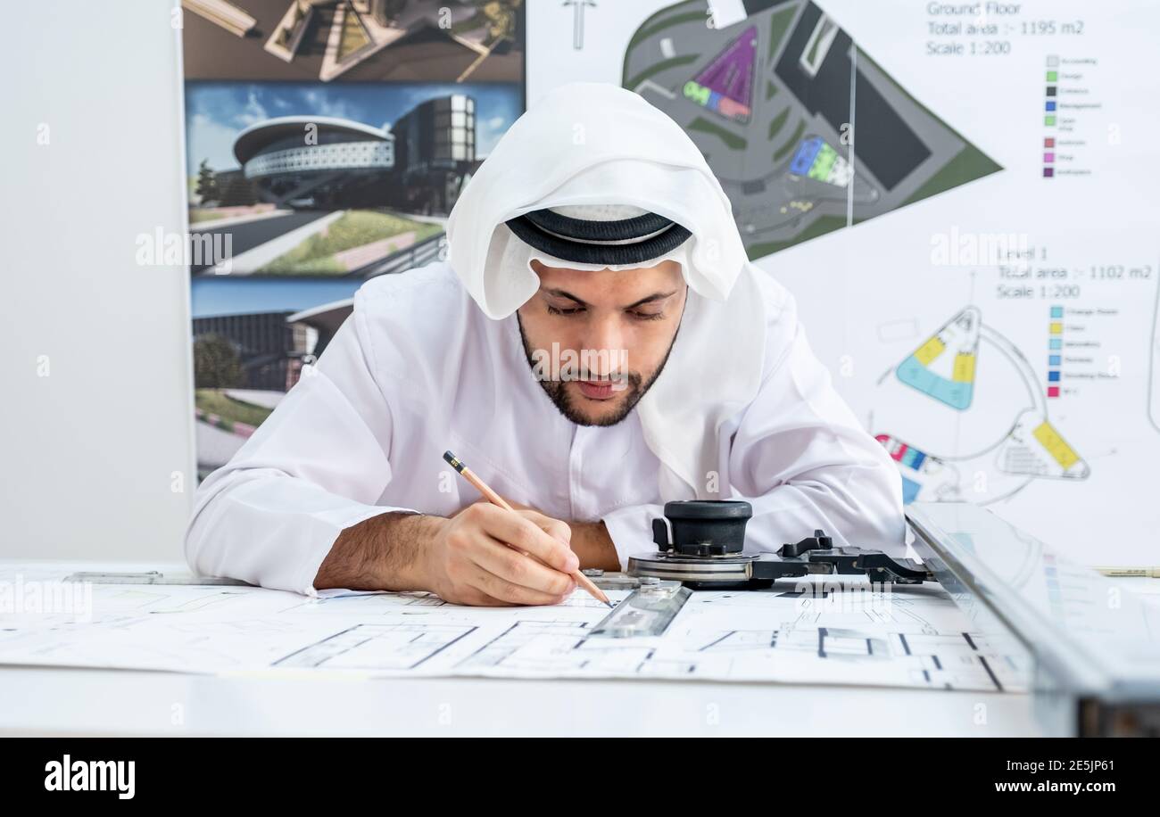 Focused arab architect working on a new project Stock Photo
