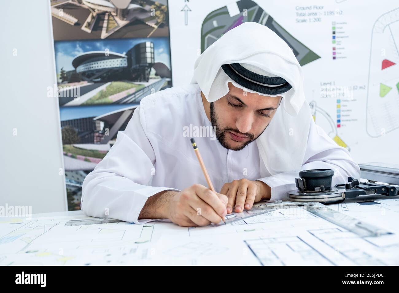Focused arab architect working on a new project Stock Photo