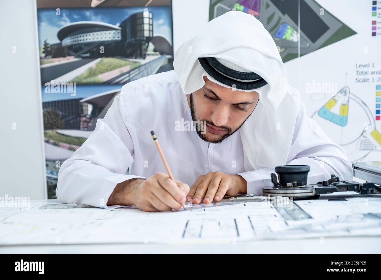 Focused arab architect working on a new project Stock Photo