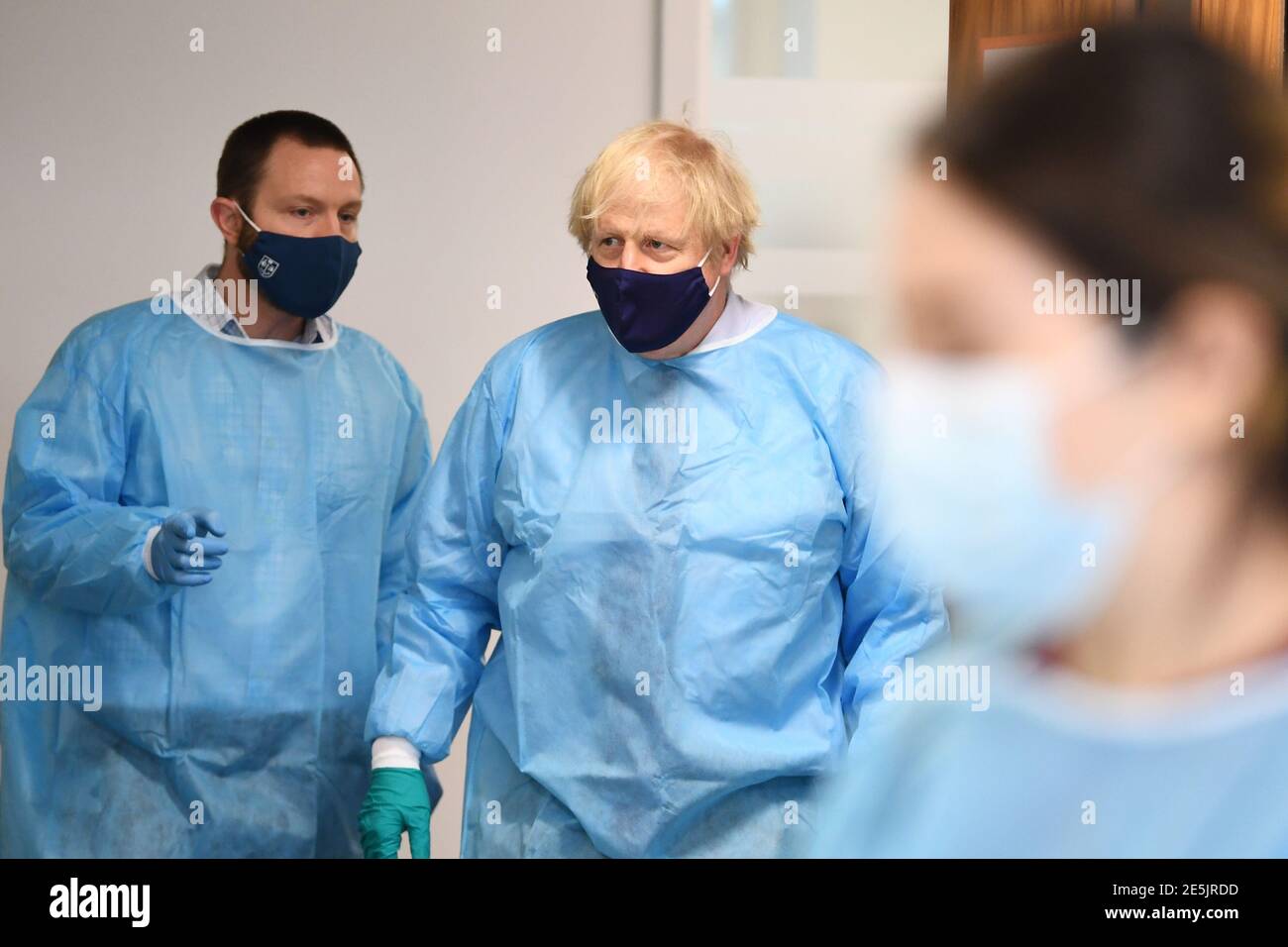 Prime Minister Boris Johnson is shown the Lighthouse Laboratory, used ...