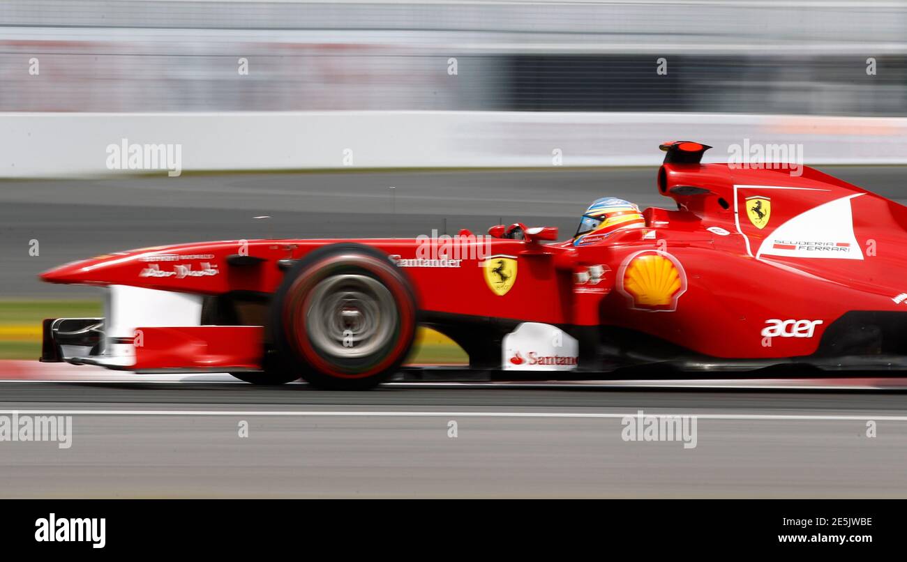 Ferrari Formula One driver Fernando Alonso of Spain drives during the third practice session of the Canadian F1 Grand Prix at the Circuit Gilles Villeneuve in Montreal June 11, 2011.  REUTERS/Chris Wattie (CANADA  - Tags: SPORT MOTOR RACING) Stock Photo