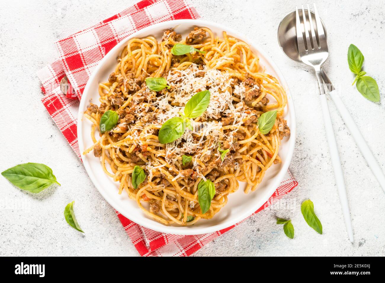 Pasta Bolognese in white plate top view. Stock Photo