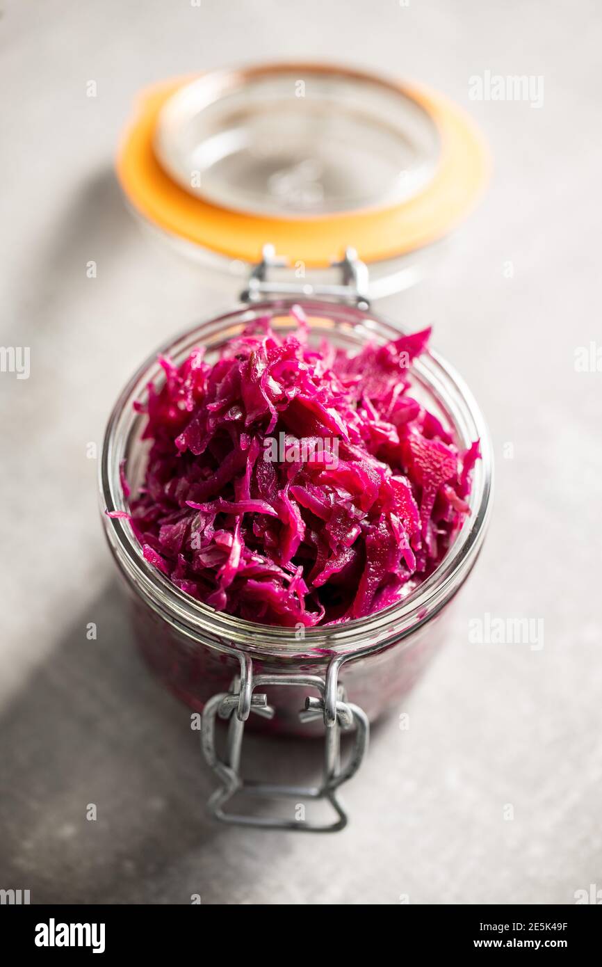 Red sauerkraut. Sour pickled cabbage in jar Stock Photo Alamy