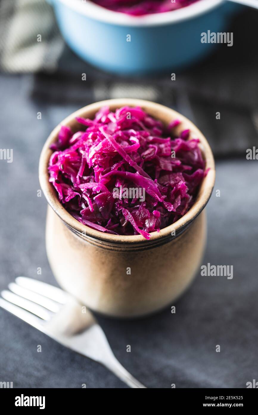 Red sauerkraut. Sour pickled cabbage in a cup. Stock Photo
