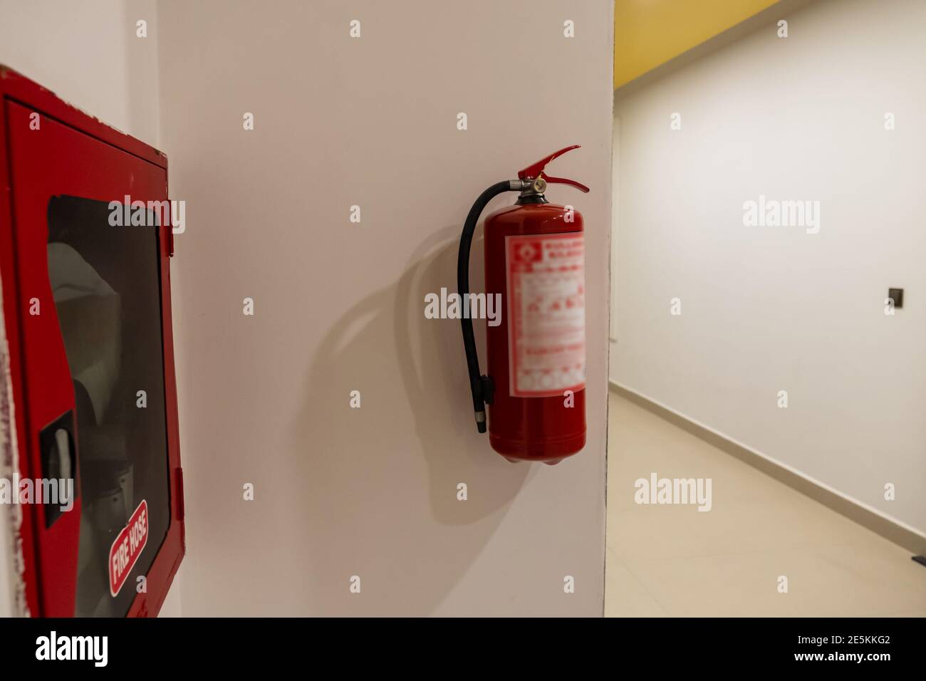 Fire fighting kit in a an entrance of a compound or building to