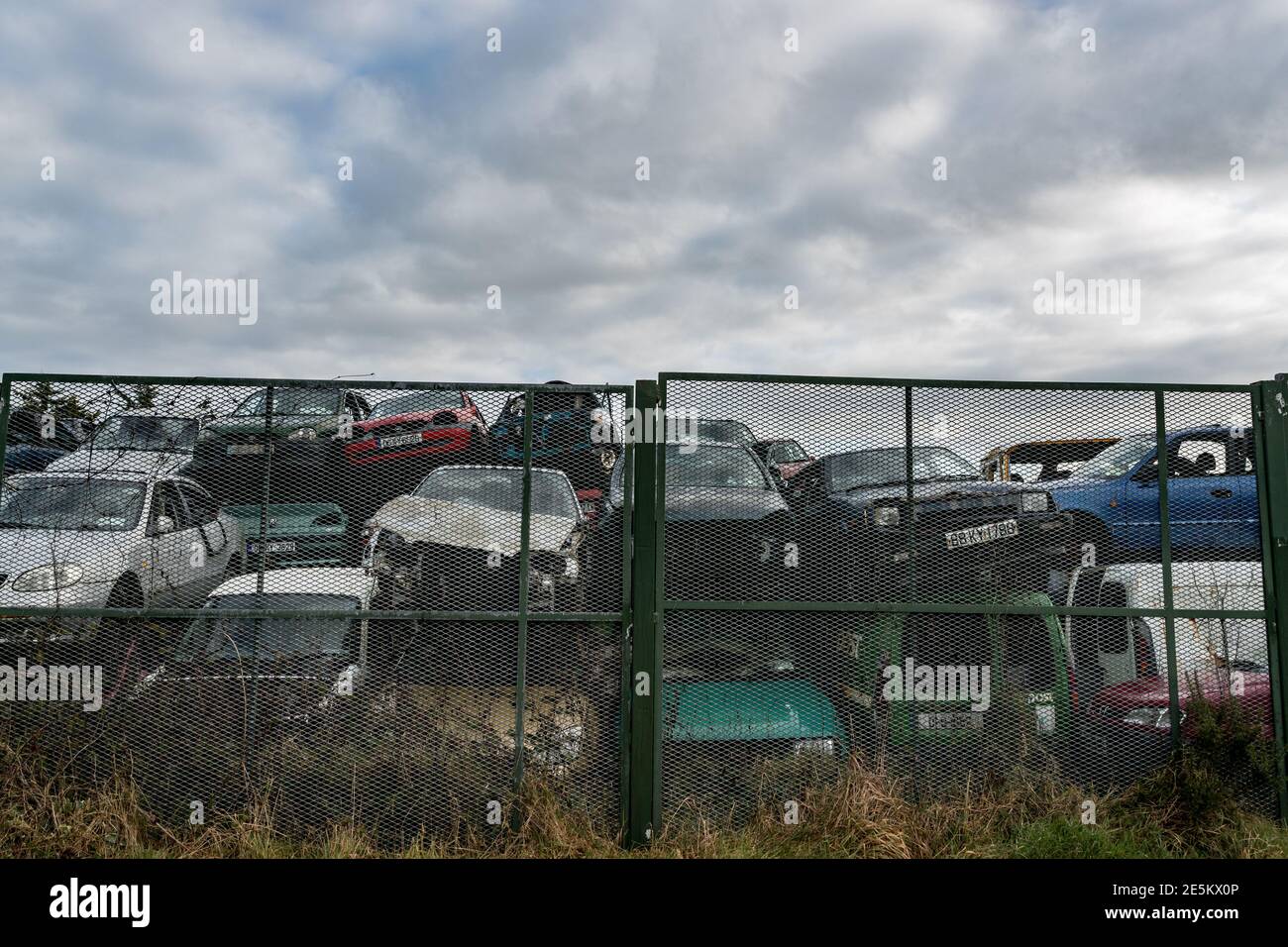 Listowel, Ireland - 7th January 2021: Pile of discarded old cars in a   junkyard. Stock Photo