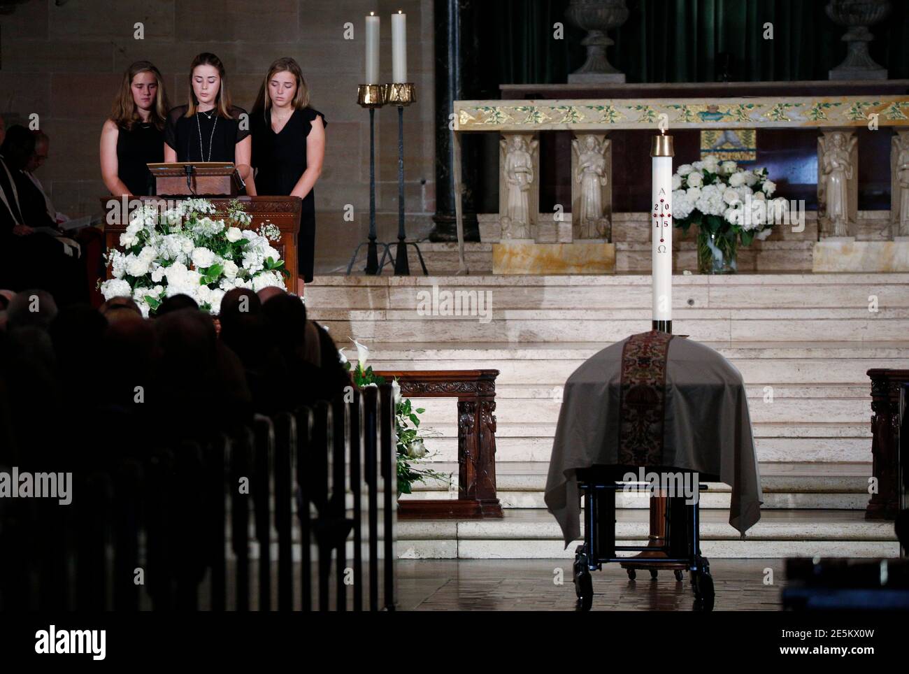 Vice President Joe Biden's grandaughters Naomi, Maisy and Finnegan Biden participate in a reading during their uncle Beau Biden's funeral in Wilmington, Delaware in St. Anthony of Padua church in Wilmington, Delaware June 6, 2015.  REUTERS/Kevin Lamarque Stock Photo