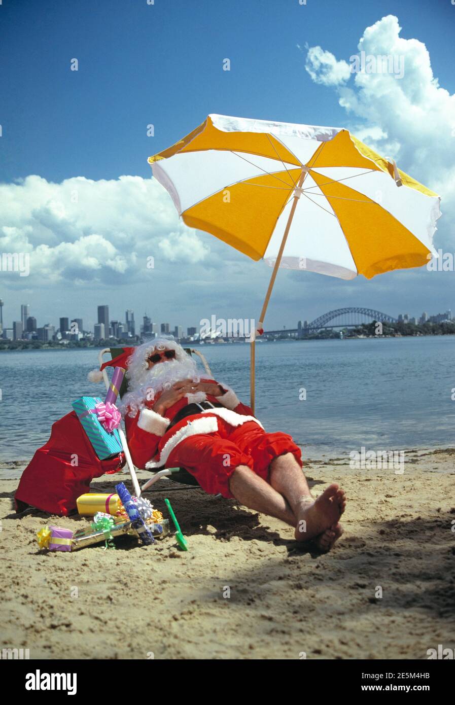 Australia. Sydney. Christmas in summer. Santa Claus at the beach. Stock Photo