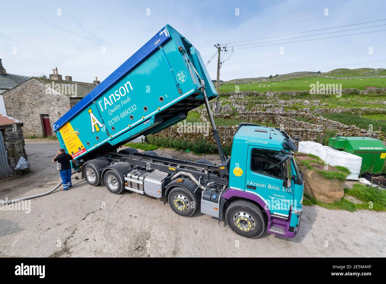 Animal feed supplier delivering livestock feed to a hill farm in North