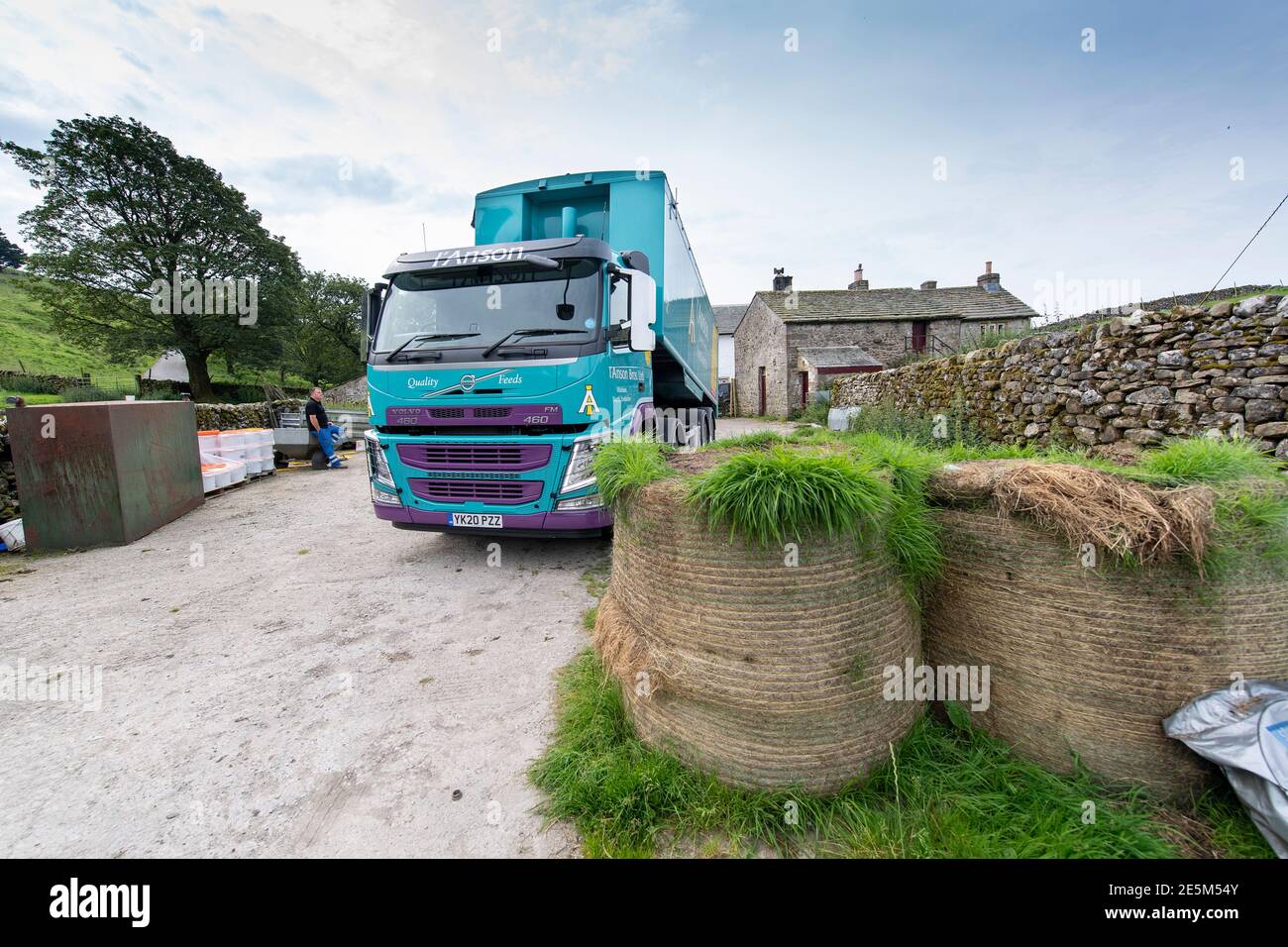 Animal feed supplier delivering livestock feed to a hill farm in North