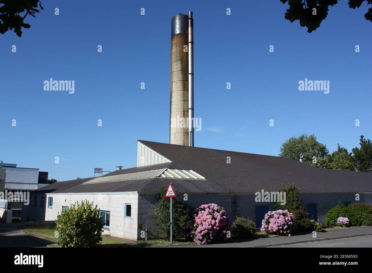 Guernsey. St Andrews. Princess Elizabeth Hospital. Hospital waste incineration block with exhaust chimney. Stock Photo