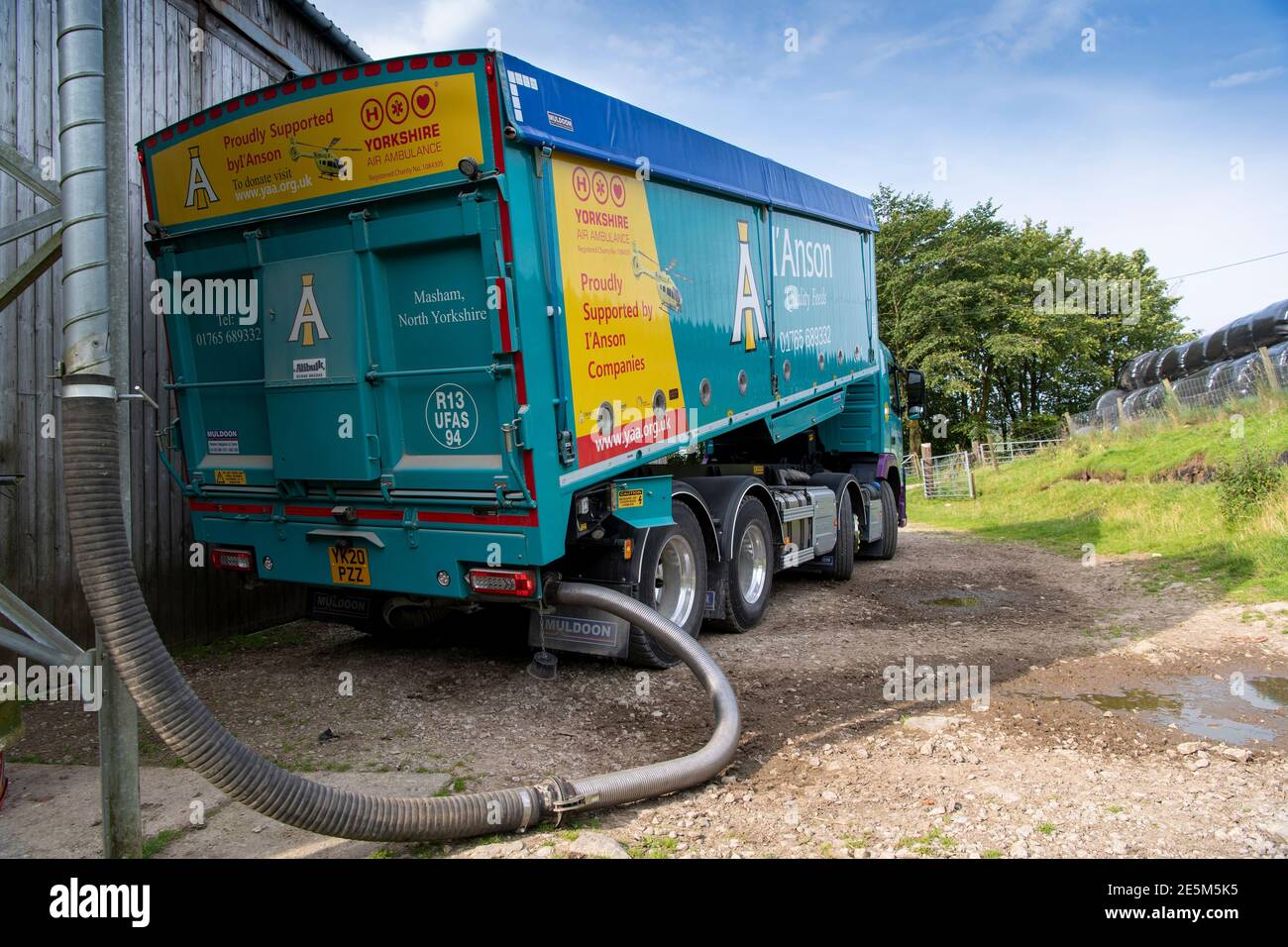 Animal feed supplier delivering livestock feed to a hill farm in North