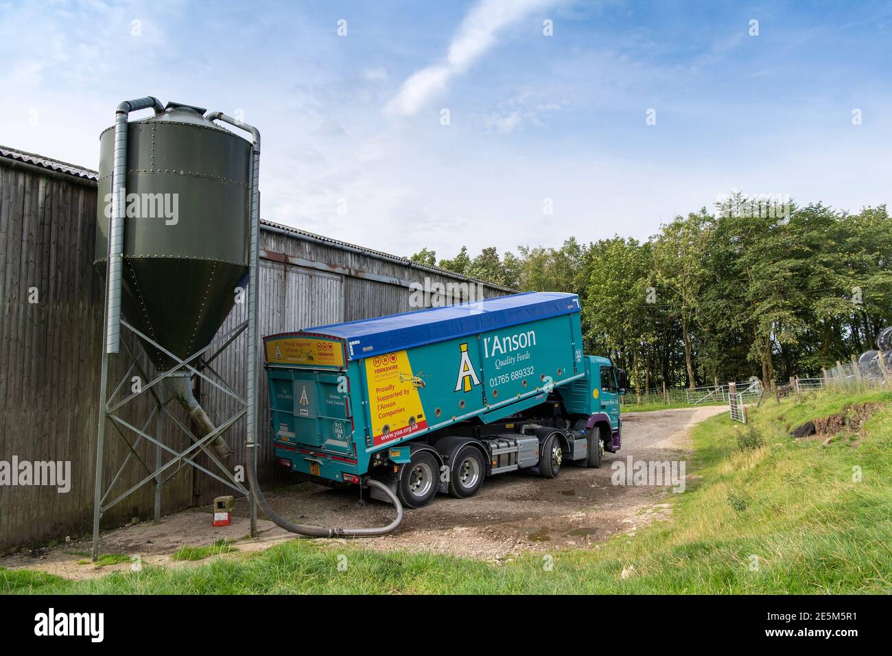 Animal feed supplier delivering livestock feed to a hill farm in North