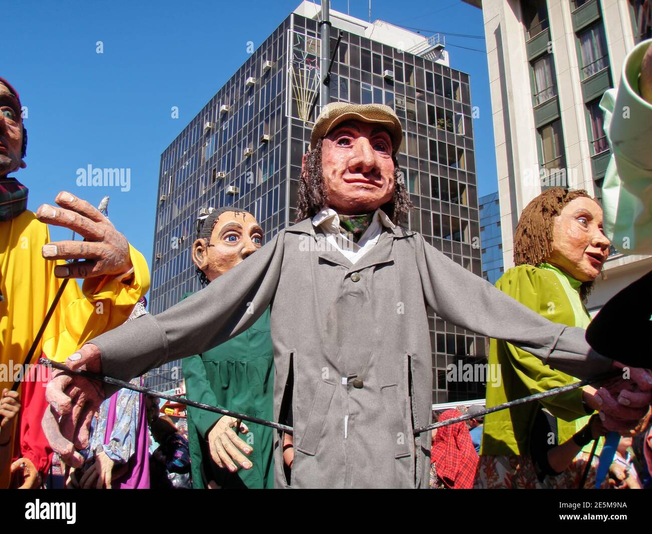 Giant puppets at carnival, parade on the square in Valparaiso, Chile
