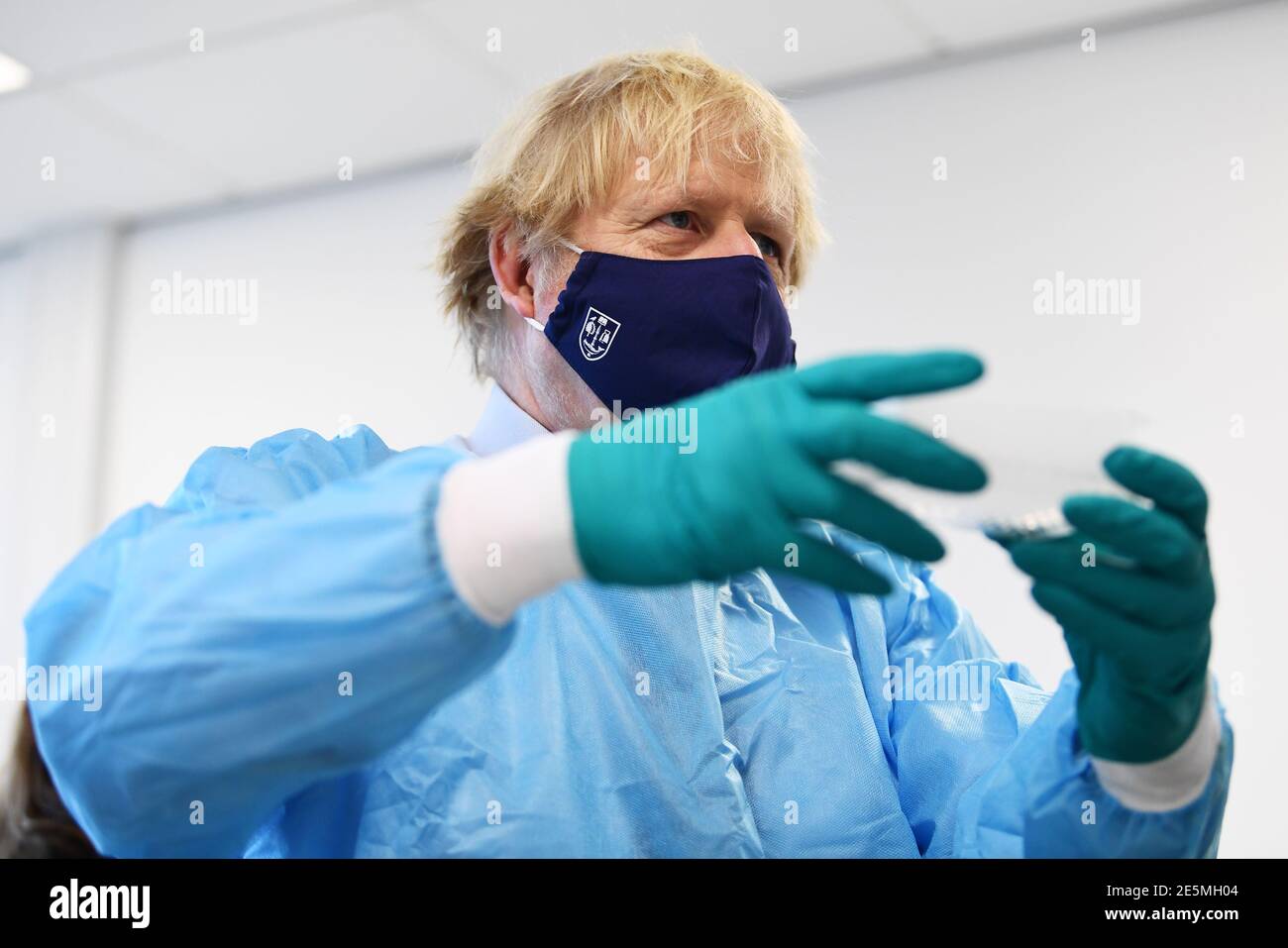 Prime Minister Boris Johnson is shown the Lighthouse Laboratory, used ...