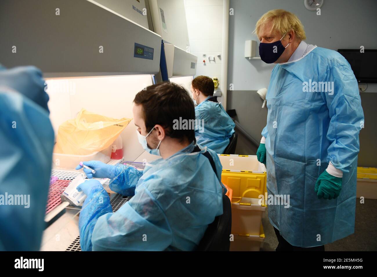 Prime Minister Boris Johnson is shown the Lighthouse Laboratory, used