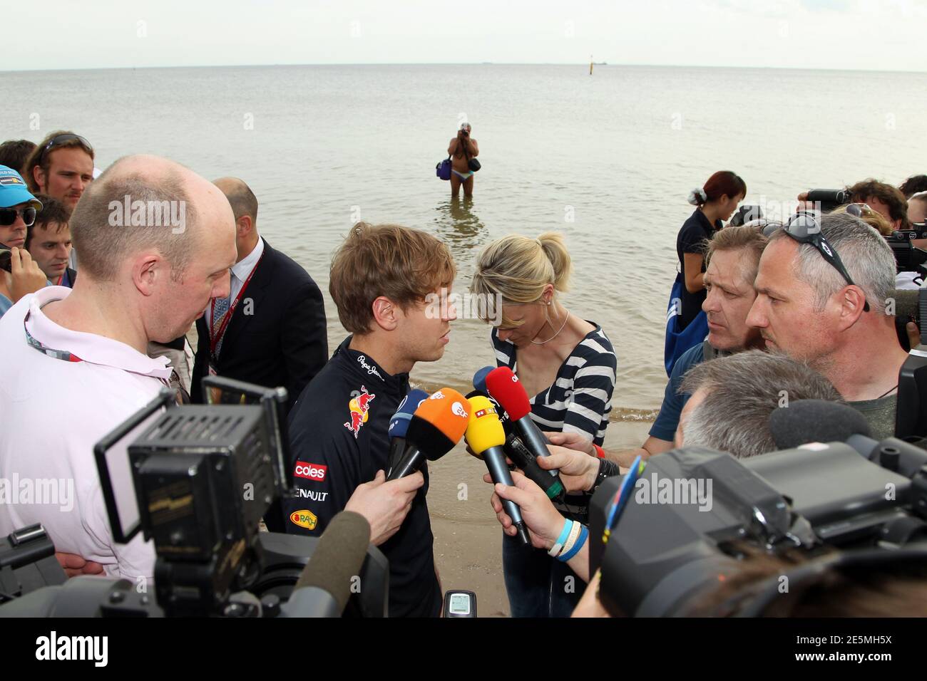 Red Bull Racing Formula One team Sebastian Vettel gives an interview on St Kilda Beach during press event in Melbourne before the first day the Australian F1 Grand Prix,