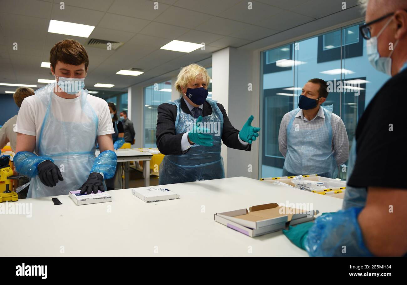 Prime Minister Boris Johnson is shown the Lighthouse Laboratory, used
