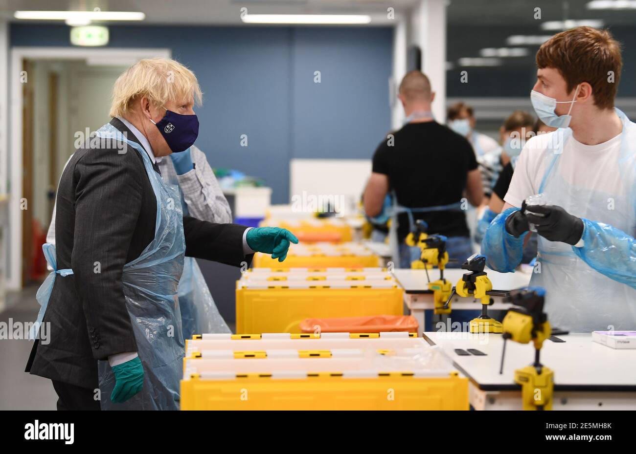 Prime Minister Boris Johnson is shown the Lighthouse Laboratory, used