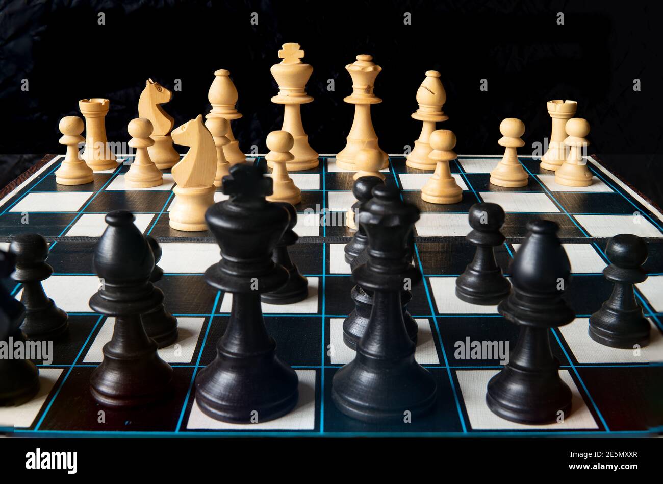 Chess. Board with classic pieces in colour. opening play Stock Photo