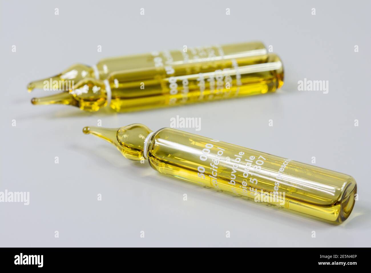 Vitamin D ampoule, inscriptions in French Stock Photo - Alamy