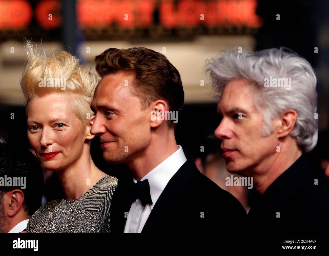 L R Cast Memberstilda Swinton Tom Hiddleston And Director Jim Jarmusch Pose On The Red Carpet As They Arrive For The Screening Of The Film Only Lovers Left Alive In Competition During The L R Cast Memberstilda Swinton Tom Hiddleston And Director Jim Jarmusch Pose On The Red Carpet As They Arrive For The Screening Of The Film Only Lovers Left Alive In Competition During The