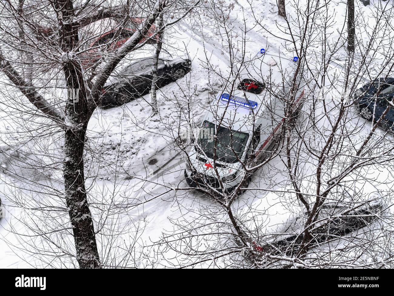 Ambulance car with flashing lights on. Stock Photo