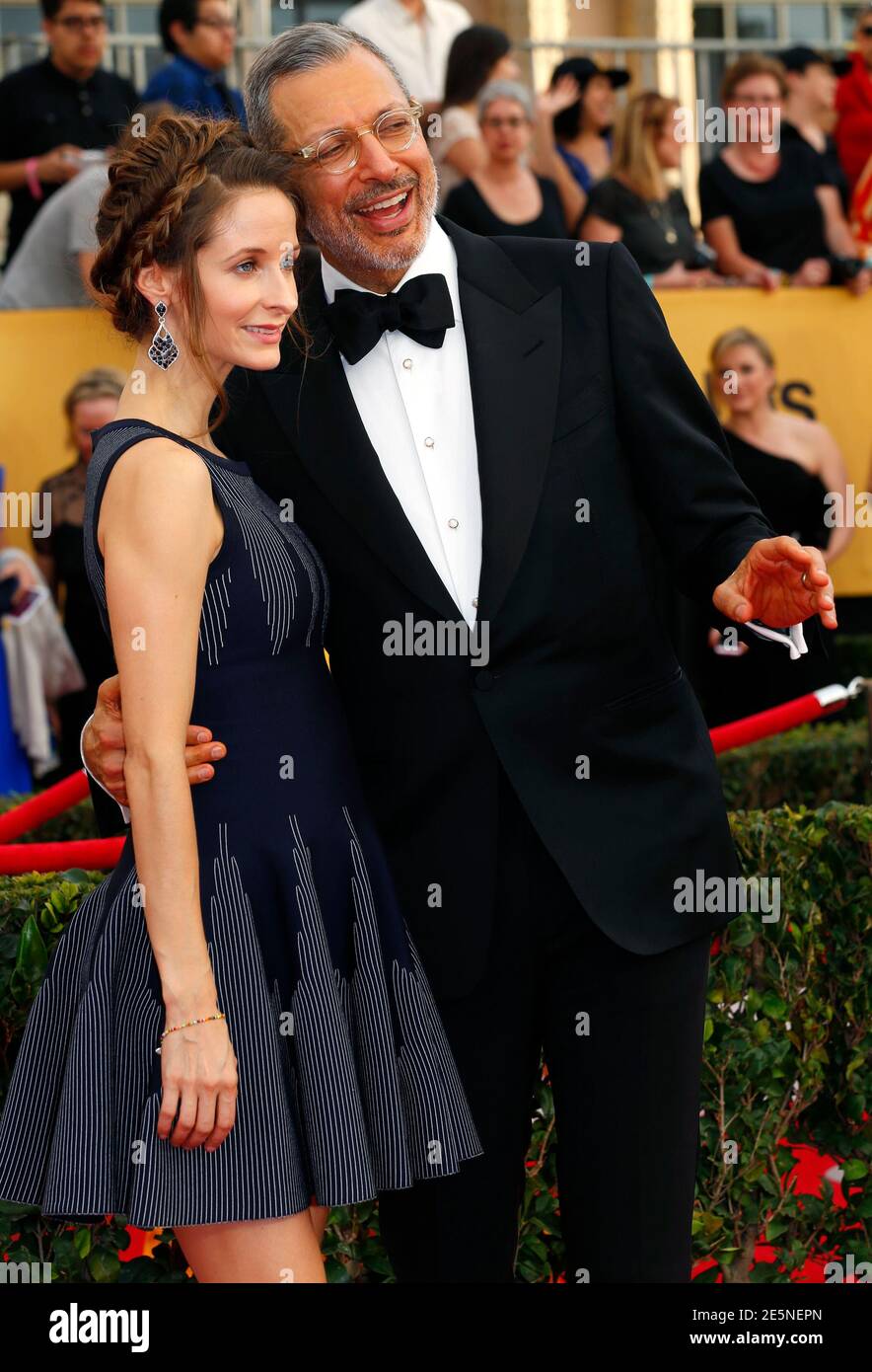 Actor Jeff Goldblum and his wife Emilie Livingston arrive at the 21st annual Screen Actors Guild Awards in Los Angeles, California January 25, 2015.    REUTERS/Mike Blake (UNITED STATES  - Tags: ENTERTAINMENT)   (SAGAWARDS- ARRIVALS) Stock Photo